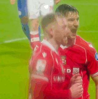 Two Soccer Players Hugging United Jersey GIF