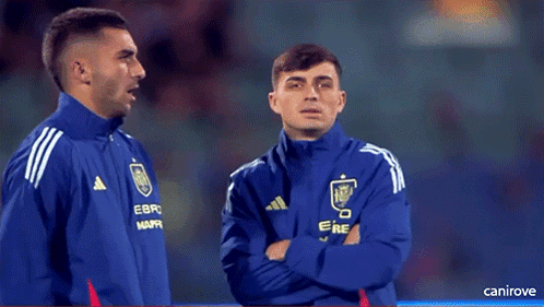 Two Soccer Players In Blue Adidas Jackets GIF