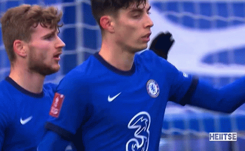 Two Soccer Players in Blue Jerseys Number 3