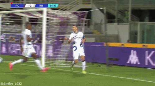 Two Soccer Players Kneeling One Number 30
