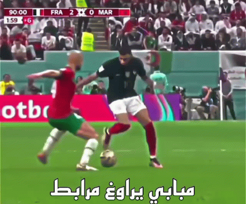 Two Soccer Players On A Field With A Scoreboard That Says Fra 2 0 Mar GIF