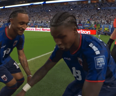 Two Soccer Players On A Field With A Sign That Says Best Network GIF