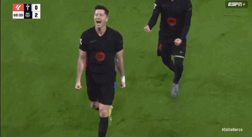Two Soccer Players On A Field With The Espn Logo On The Bottom GIF