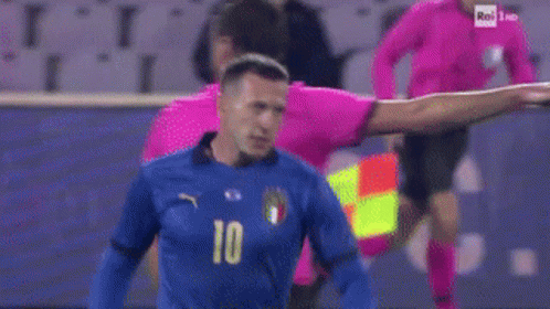 Two Soccer Players On A Field With The Number 4 On Their Shirt GIF