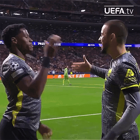 Two Soccer Players On A Field With Uefa.tv Written On The Bottom Right GIF