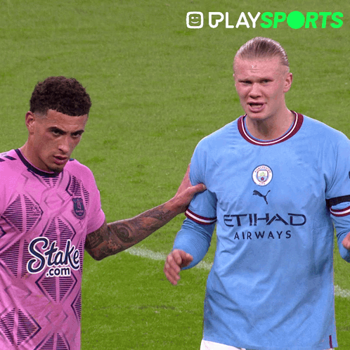 Two Soccer Players One in Etihad Airways Shirt