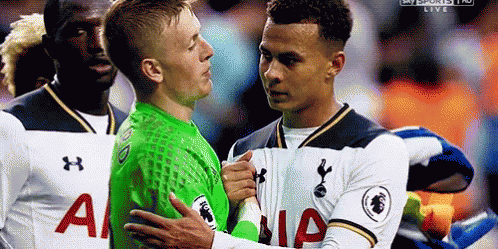 Two Soccer Players One in Green Jersey With Letter A