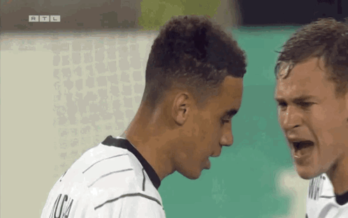 Two Soccer Players One in Mora Jersey