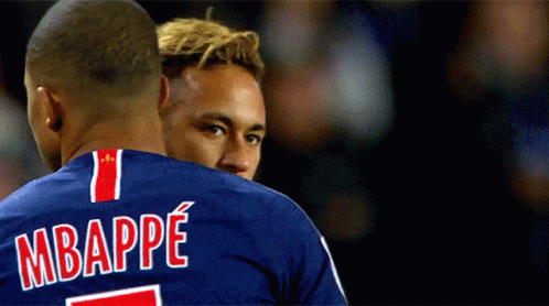 Two Soccer Players One Of Whom Has The Name Mbappe On His Shirt GIF