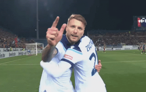 Two Soccer Players One Of Whom Has The Number 2 On His Shirt GIF