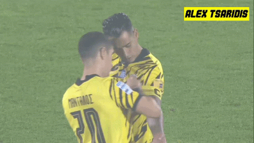 Two Soccer Players One Of Whom Has The Number 20 On Their Jersey GIF