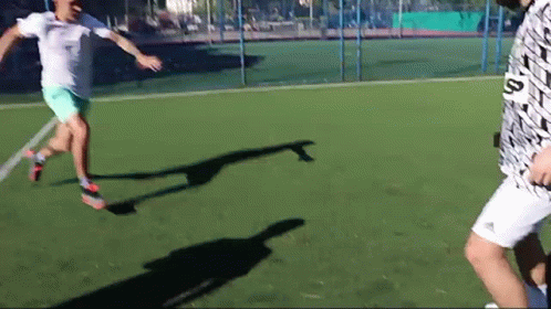 Two Soccer Players One With Letter S Shirt