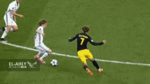 Two Soccer Players One With Number 7 Jersey GIF