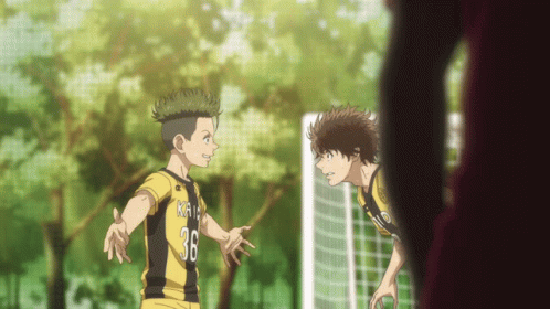 two soccer players one with the number 36 on his jersey