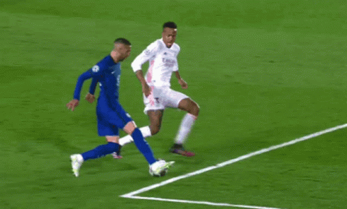 Two Soccer Players Playing Soccer