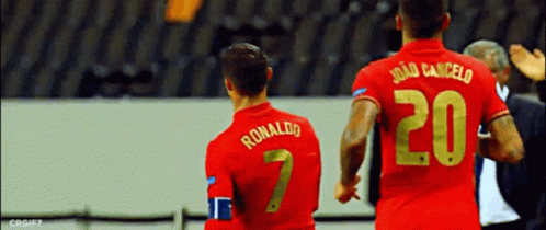 Two Soccer Players Ronaldo and Joao Cancelo