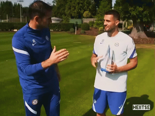 Two Soccer Players Talking With Heitse GIF