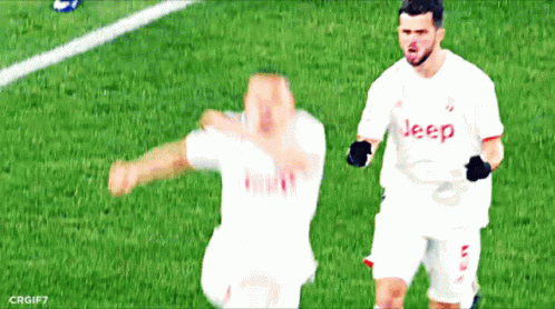 Two Soccer Players Wearing White Jerseys With Jeep On The Front GIF