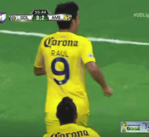 two soccer players wearing yellow jerseys with the number 9 on them