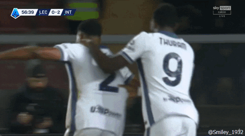 Two Soccer Players With The Number 9 On Their Backs GIF