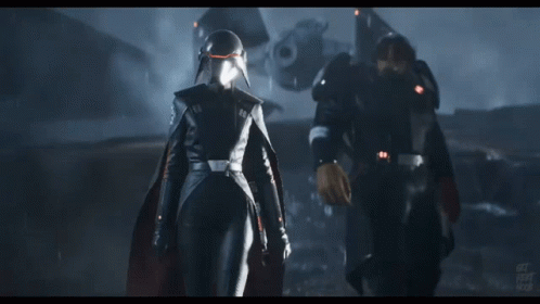 Two Soldiers Are Standing Next To Each Other And One Of Them Is Wearing A Helmet With The Letters Jdp On It GIF
