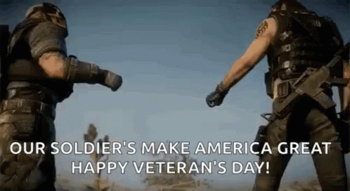 Two Soldiers Fist Bump in Desert