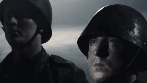 Two Soldiers in Dark Room