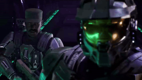 Two Soldiers Standing One With Green Helmet