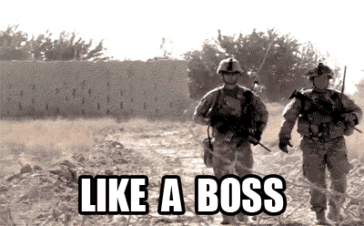 Two Soldiers Walking In A Field With The Words Like A Boss On The Bottom GIF