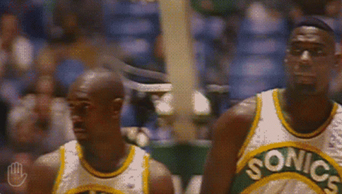 Two Sonics Basketball Players in Front of Crowd