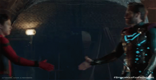 two spider man characters shaking hands in a scene from spider man far from home