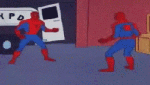 Two Spidermans Are Standing Next To Each Other In A Room In Front Of A Van . GIF