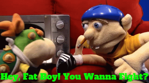 Two Stuffed Animals Are Sitting Next To Each Other With The Words " Hey Fat Boy You Wanna Fight " On The Bottom GIF
