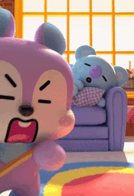 Two Stuffed Animals Are Sitting On A Couch And One Is Sleeping GIF