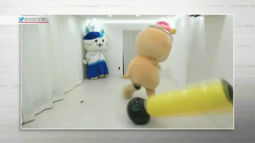 Two Stuffed Animals Are Standing Next To Each Other On A Screen That Says ' Last Week Tonight ' On It GIF