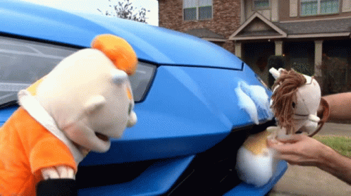 Two Stuffed Animals Cleaning Blue Car GIF