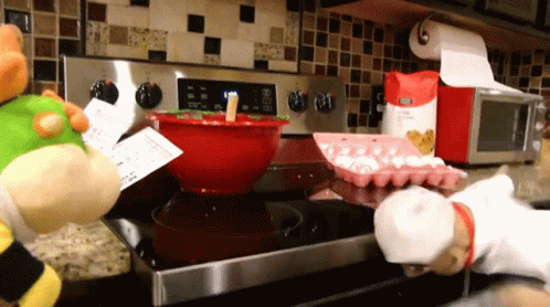 Two Stuffed Animals Cooking One With Receipt Saying A