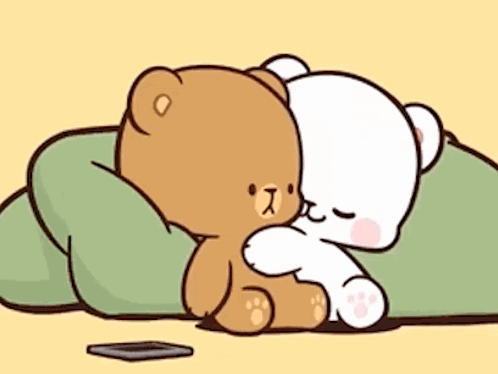 Two Teddy Bears Hugging on a Blanket