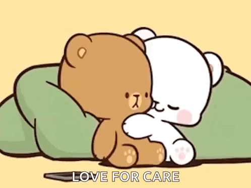 Two Teddy Bears Hugging On Pillow GIF
