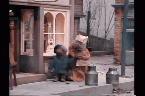 Two Teddy Bears Outside Store