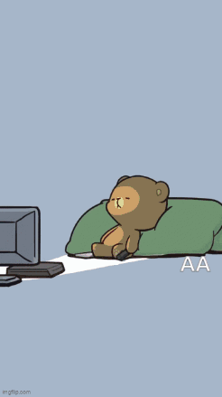 Two Teddy Bears Sitting in Front of Computer