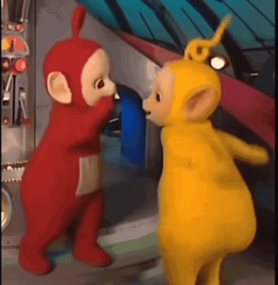Two Teletubbies Standing In A Room GIF