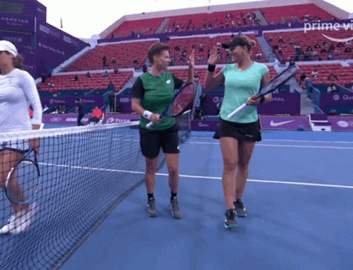 Two Tennis Players On A Court With The Word Prime In The Upper Right Corner GIF
