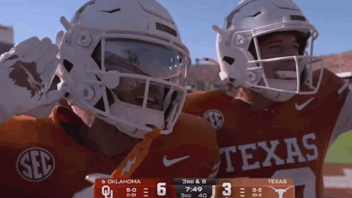 Two Texas Football Players Celebrating Score