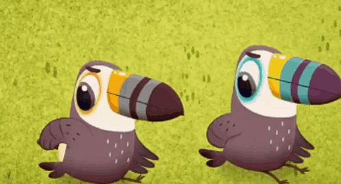 Two Toucans Standing in Green Field