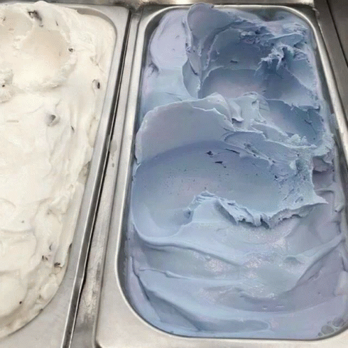 Two Trays Of Ice Cream One Of Which Is White And One Of Which Is Blue GIF