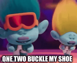 Two Trolls Wearing Sunglasses Are Dancing With The Caption One Two Buckle My Shoe . GIF
