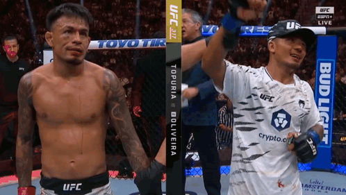 Two UFC Fighters Standing Next to Each Other