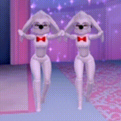 Two White Rabbits Wearing Red Bow Ties Are Dancing On A Stage GIF