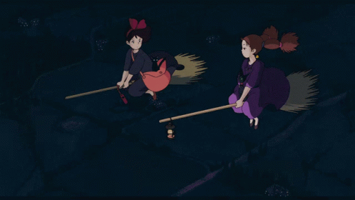 Two Witches Flying on Brooms in Night Sky